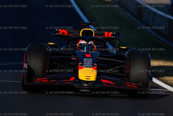 Max Verstappen’s Red Bull #1 (dark blue car) leads confidently on the Shanghai International Circuit during the F1 Grand Prix of China.
