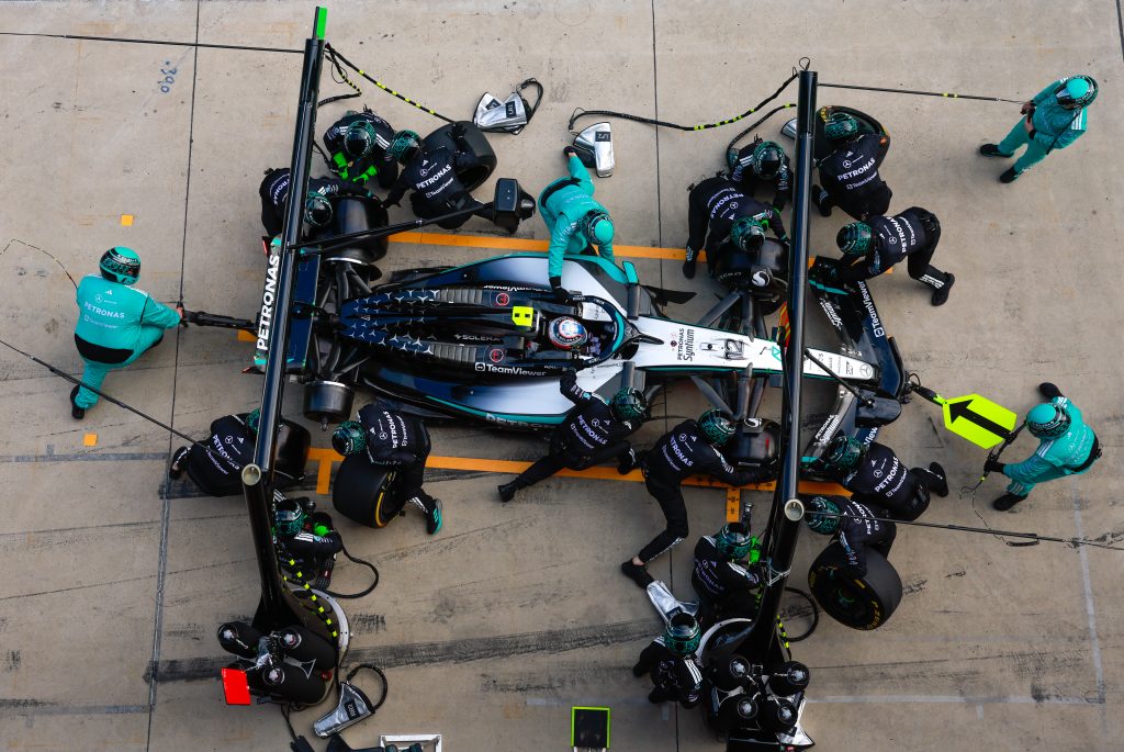 Mercedes (silver car) makes a pit stop for #12 Andrea Kimi Antonelli during the Formula 1 Grand Prix at Shanghai International Circuit.